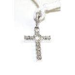 An 18 carat white gold diamond cross pendant, set throughout with round brilliant cut diamonds in
