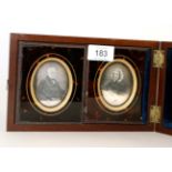 Two photographic portraits in mahogany box, 21cm wide