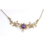 An amethyst and seed pearl necklace, a round cut amethyst in a yellow claw setting within a border