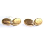 A pair of 15 carat gold double oval cufflinks, double bar linked, monogrammed The cufflinks are in