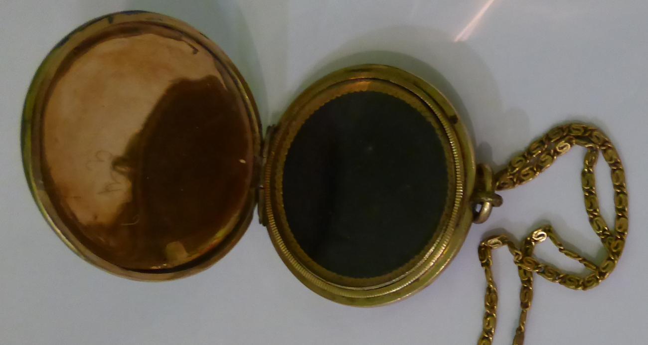 A blue guilloche enamel locket, a circlar locket with applied scroll decoration, hinged to open - Image 4 of 4