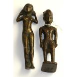 A bronze figure of a pharaoh standing wearing headdress, 14.5cm high; and a similar figure of a