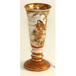 A Kutani porcelain small goblet vase, Meiji period, typically painted with a fisherman in panel,