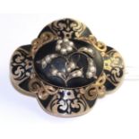 A Victorian black enamel, pearl and diamond mourning brooch, a central floral motif set with split