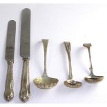 Silver sifter spoon, London 1810, two plated sifter spoons and eight steel bladed knives