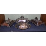 Three Victorian silver plated entree dishes and covers, of rectangular form with leaf and gadroon