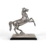 A Continental silver model of a horse stamped 'Busch 800', 25cm including plinth