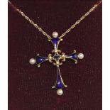 A Faberge for Franklin Mint 'Midnight Cross' pendant, a central square cut sapphire between four