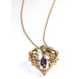 An Art Nouveau amethyst and seed pearl pendant/brooch on chain, an openwork frame set throughout
