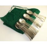 Twenty four silver soup spoons engraved with a family crest, Sheffield 1922, 58oz53.6ozt