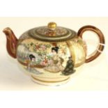 A Satsuma earthenware miniature teapot and cover, Meiji period, typically decorated with figures