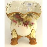 A Royal Worcester porcelain jardiniere, 1908, of square form on four hoof feet, painted with