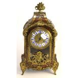 A ''boulle'' striking mantel clock, circa 1900, elaborate case with gilt metal mounts, 4-inch case