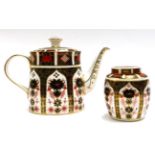 A Royal Crown Derby Imari teapot, together with a Royal Crown Derby Imari ginger jar and cover (2)