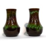 Christopher Dresser for Linthorpe Pottery: Two Vases, shape No.60, decorated with a repeating