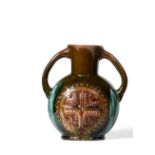 Christopher Dresser for Linthorpe Pottery: A Twin-Handled Vase, shape No.337, moulded with a