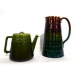 Christopher Dresser for Linthorpe Pottery: A Jug, shape No.633, repeating design, impressed