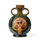Christopher Dresser for Linthorpe Pottery: A Twin-Handled Vase, shape No.336, moulded with an