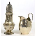 A silver cream jug and a sugar castor