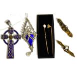 A group of gold brooches and stick pins together with two enamel pendants