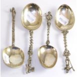 Four Dutch silver spoons, 18th/19th century, various marks, figural terminals (4)