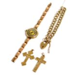 A 9ct gold lady's wristwatch, a gold bracelet with padlock clasp and two gold cross pendants