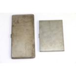 Two silver cigarette cases with engine turned decoration