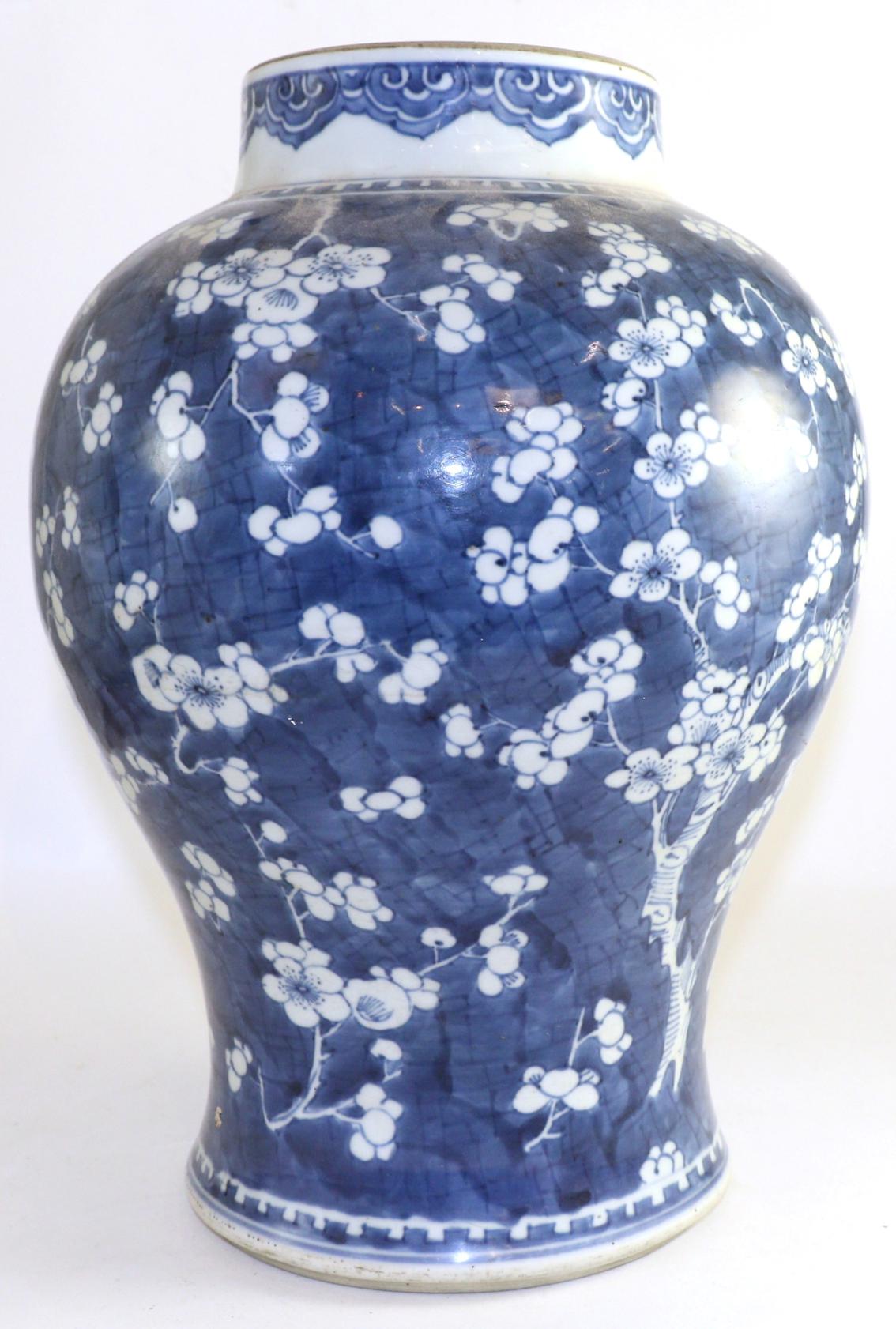 A Chinese blue and white baluster jar with prunus decoration