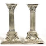 Pair of silver dwarf candlesticks
