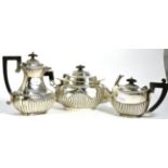 A Mappin & Webb silver teapot; together with a similar bachelors silver teapot; and a Scottish