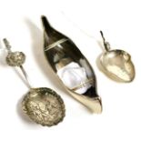 Silver novelty canoe, Chester 1896 by Stokes & Ireland Ltd and two silver caddy spoons