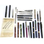 Assorted fountain pens and propelling pencils, including two silver examples