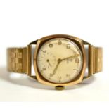 A 9ct gold cushion shaped wristwatch, signed Tudor