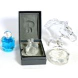 A Lalique glass Nu Nabhi figure, boxed; with a Baccarat horse head and two other paperweights (4)