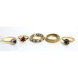 Two 9ct gold sapphire and diamond cluster rings, a 9ct gold garnet cluster ring and two 9ct gold