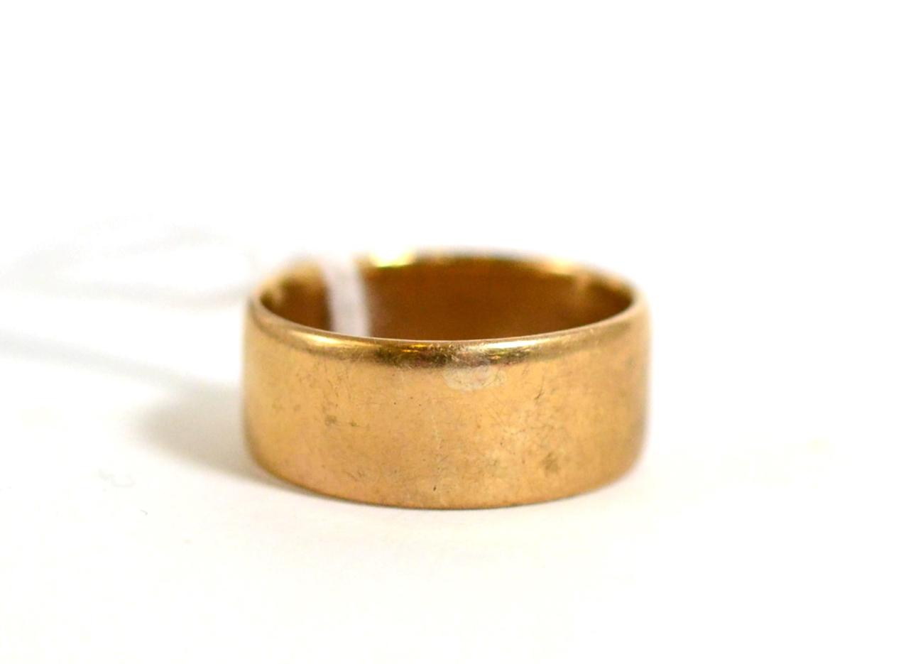 A 9ct gold band ring