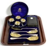A Victorian set of four silver cauldron salts, by CS, London 1873, cased; together with a set of