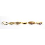 An elephant hair ring, a 9ct gold amethyst and seed pearl ring, a 9ct gold onyx ring, a sardony