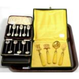 Six sets of boxed silver coffee spoons; together with a cased set of French gilt metal serving items