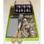 A large group of assorted silver tea and coffee spoons; butter knives; cake forks etc