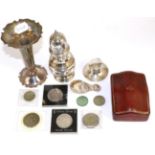 Silver sugar castor; silver caddy spoon; silver mounted inkwell; silver spill vase; and a quantity