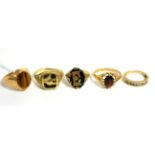 A 9ct gold tiger's eye signet ring, three other 9ct gold rings and a signet ring stamped '9c' (5)