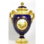 A porcelain gilt decorated Coalport vase and cover, central painted scene signed E O Ball