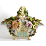 A Meissen style floral encrusted porcelain basket, bearing pseudo cross-sword mark (some damage)