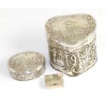 Repousse silver box with hinged cover, stamped '925'; a Continental white metal repousse box with