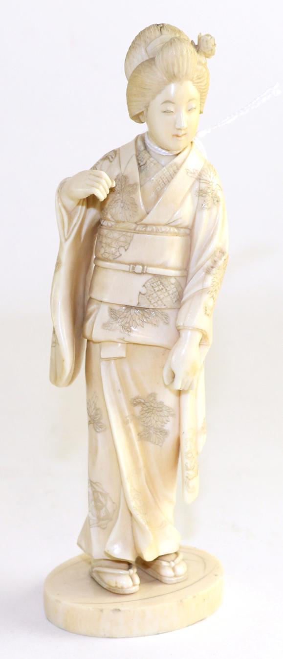 Circa 1910 Japanese ivory okimono of a girl