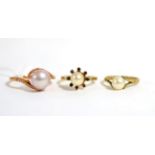 A 9ct gold cultured pearl and diamond ring, a 9ct gold cultured pearl ring and a cultured pearl ring