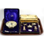 A Walker & Hall silver sugar bowl and spoon, cased; and a five piece silver cruet set, cased (case