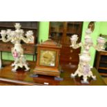 A pair of Continental porcelain seven light candelabra