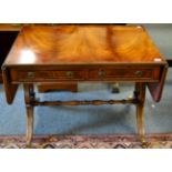 A reproduction mahogany sofa table